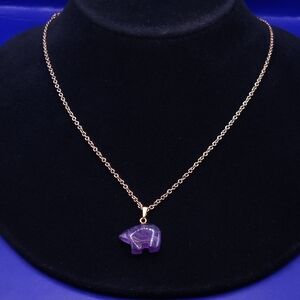 hand-carved amethyst bear pendant necklace.